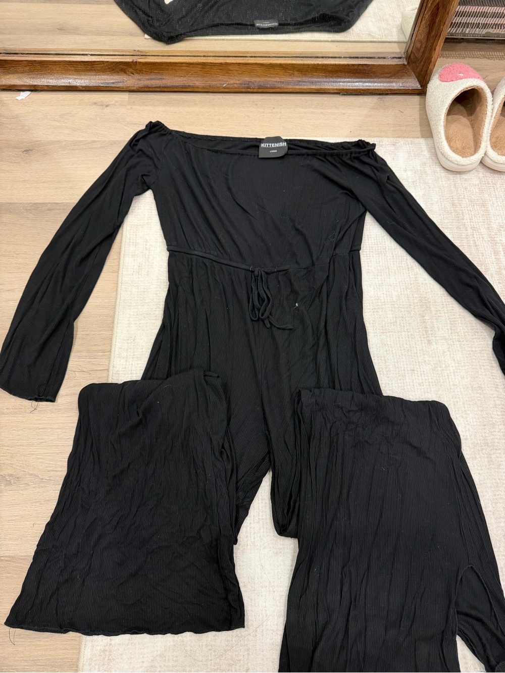 Kittenish Black Off-the-Shoulder Long-Sleeve Jumpsuit with Tie Waist